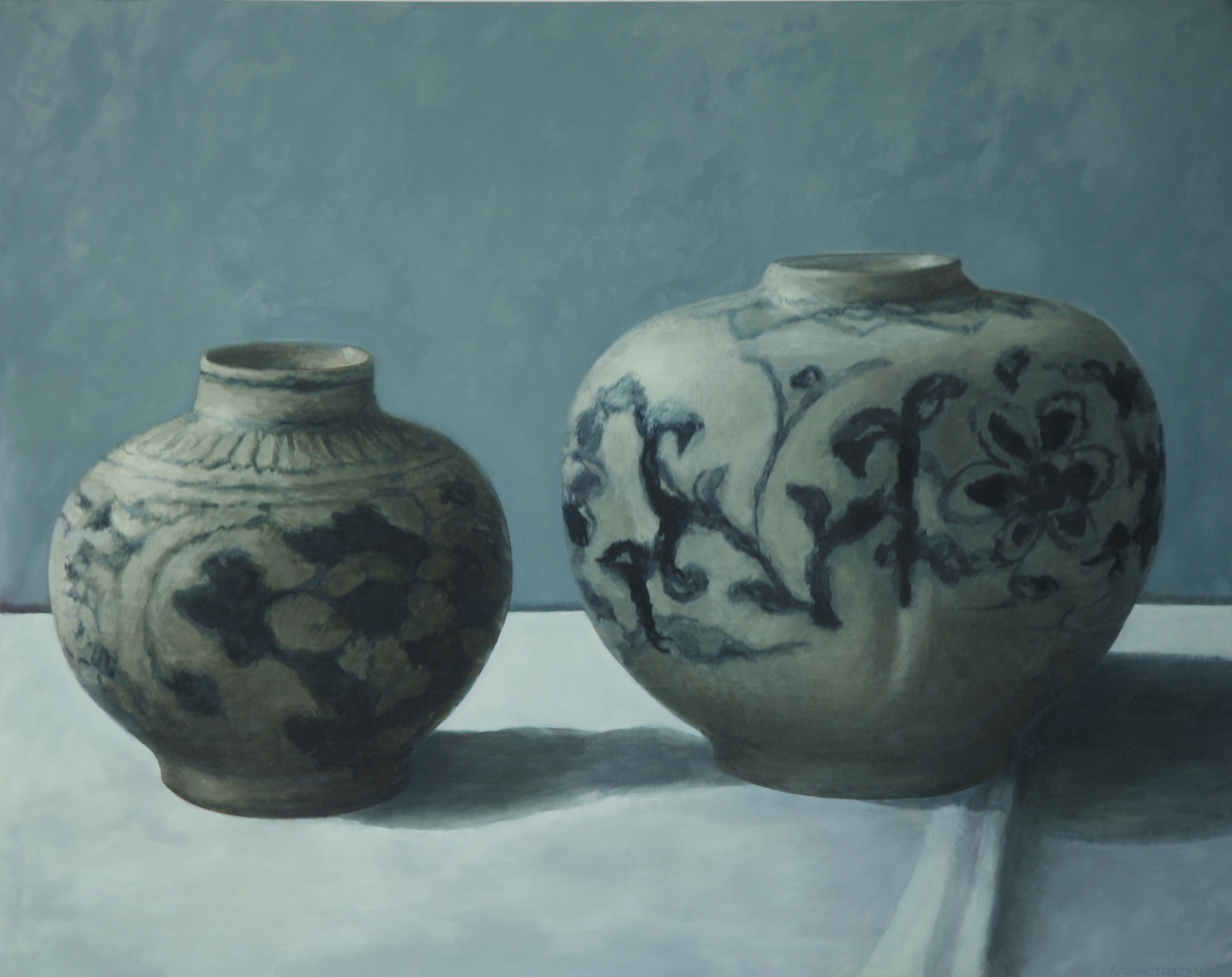 Two blue and gray Bali jars